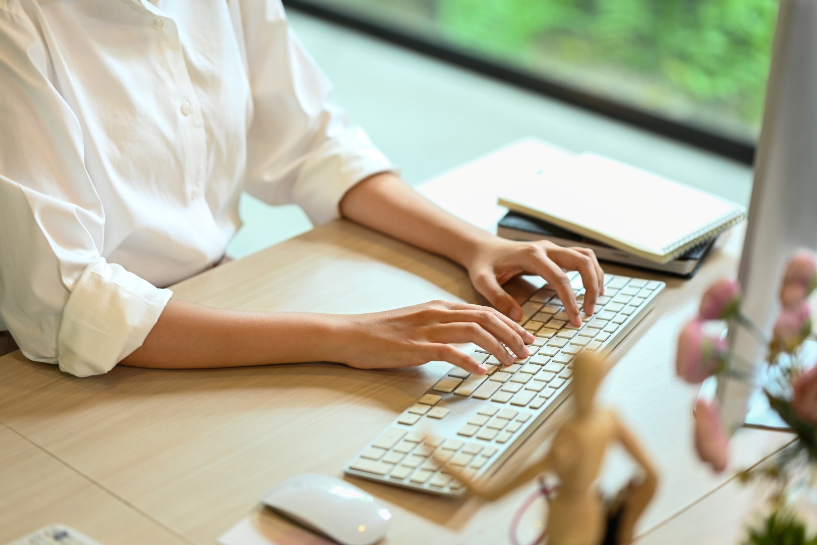 Student practicing online typing at desk — Acubens typing course Patna