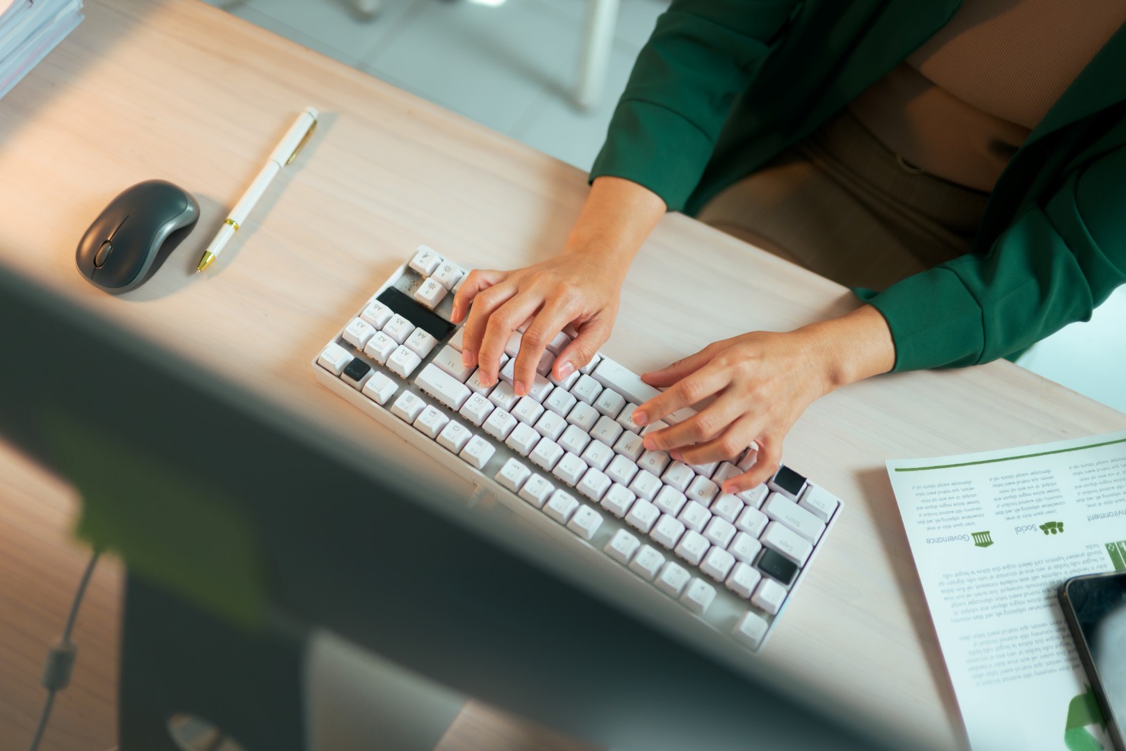 Person touch typing on keyboard with correct finger placement